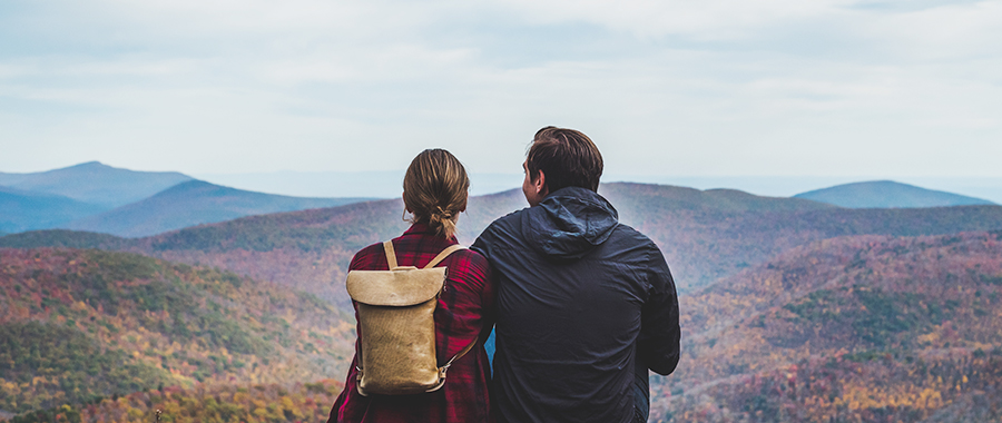 land and cabins for sale ny state image of couple overlooking adirondack mountains and fall foliage