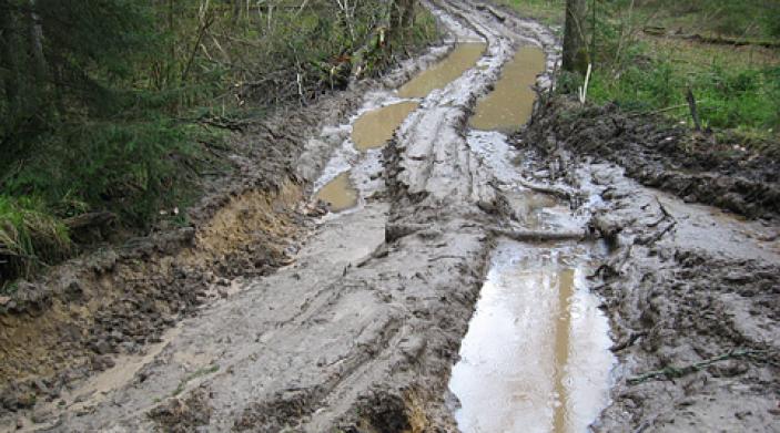 road tips for mud season near syracuse ny image of muddy road during rainy season