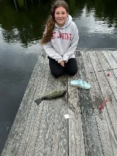 fishing on dock at camp