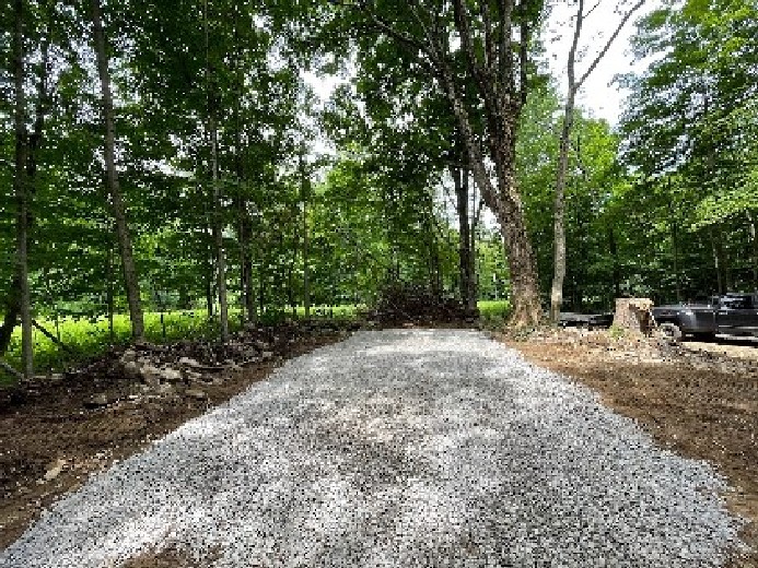 completed customer driveway by Land and Camps - Camp Crew